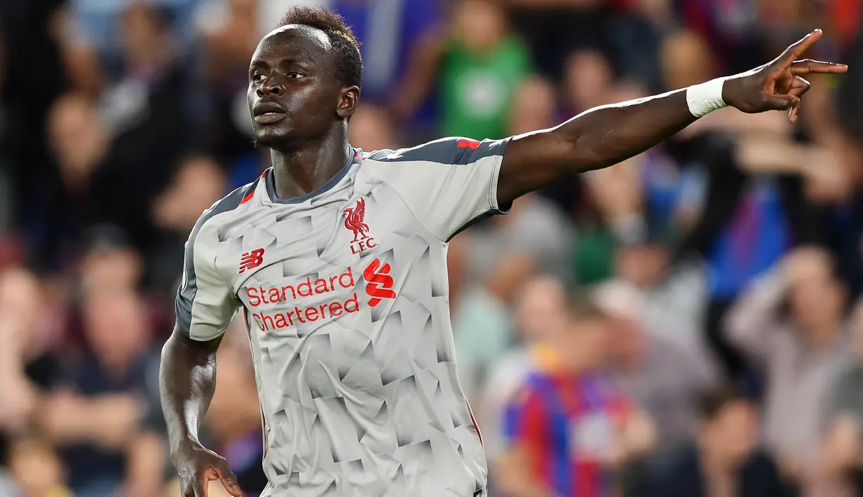 4. Sadio Mane (Liverpool) - Pemain  Senegal ini merupakan salah satu rekrutan terbaik Jurgen Klopp. Kemampuan dan konsistensi di lini depan membuat The Reds berjaya di Liga Inggris dan Eropa. Saat ini Mane berharga 108 Juta Poundsterling. (AFP/Glyn Kirk)