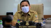 Wali Kota Tangerang Arief R. Wismansyah mengikuti kegiatan penyerahan hasil evaluasi yang bernama SAKIP & RB AWARD 2021 secara daring, Selasa (5/4/2022).