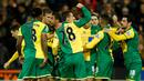Pemain Norwich City, Lewis Grabban, merayakan gol yang dicetaknya ke gawang Arsenal mencetak gol ke gawang Arsenal dalam lanjutan Liga Inggris di Stadion Carrow Road, Minggu (29/11/2015) malam WIB. (Action Images via Reuters/Andrew Boyers)