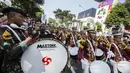 Siswa Akademi Kepolisian melakukan atraksi saat Parade Asian Games 2018 di Jakarta, Minggu (13/5/2018). Parade ini diadakan untuk mempopulerkan multievent empat tahunan tersebut. (Bola.com/Vitalis Yogi Trisna)