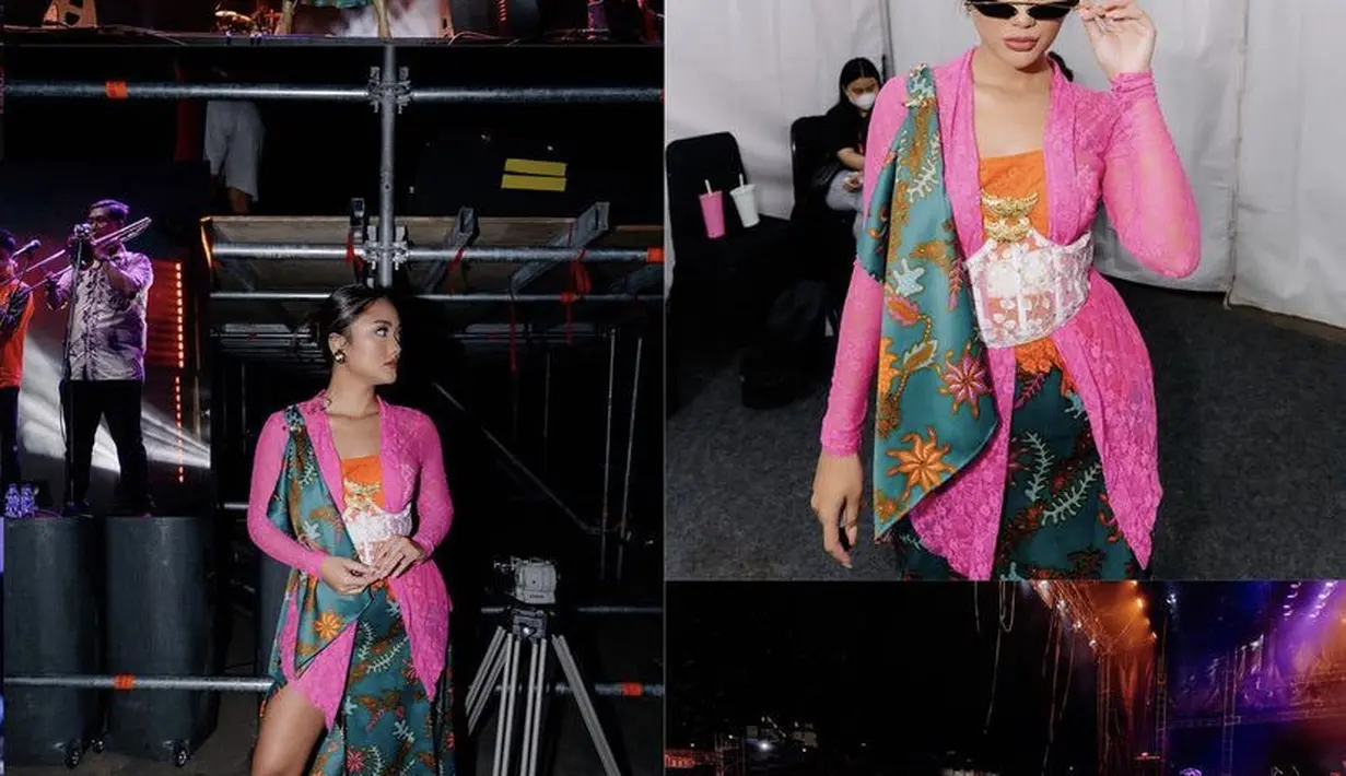 Ia juga mengenakan kebaya pink ditambah dengan bros dan korset lace putih. Dipadukan kain batik hijau sebagai bawahan dan selendangnya. (@lalamarionmj)