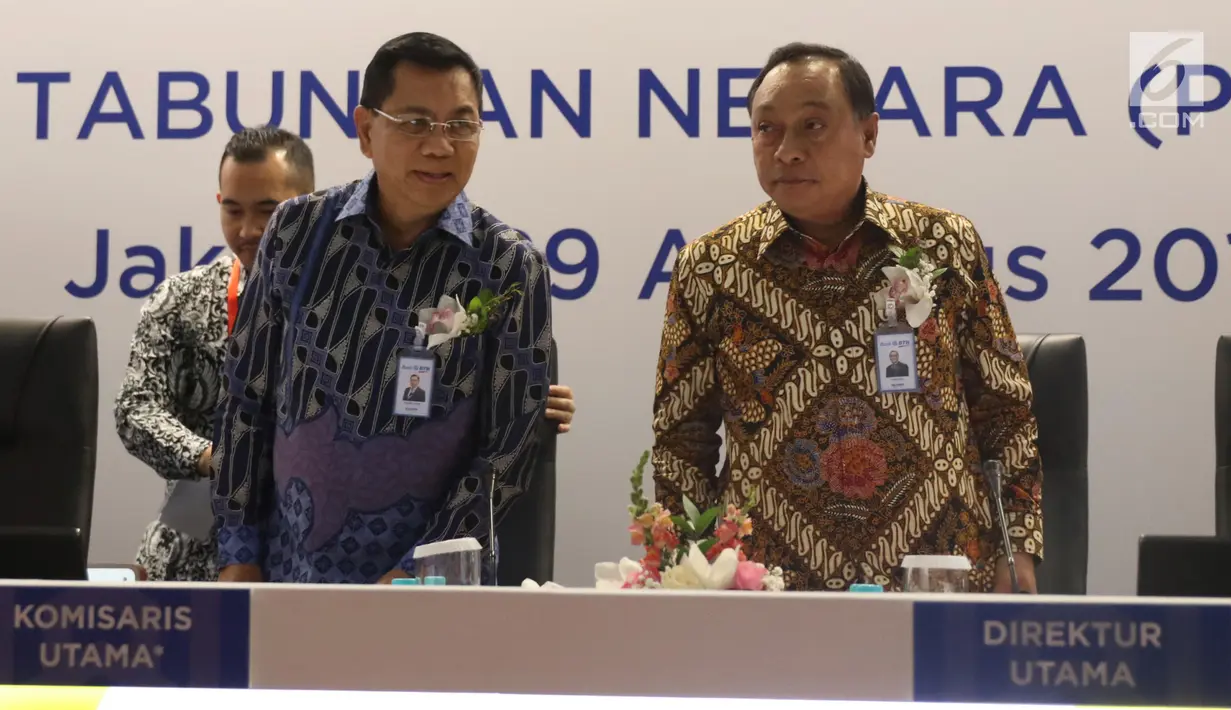 Direktur Utama PT Bank Tabungan Negara (Persero) Tbk. Maryono dan Komisaris utama, Asmawi Syam bersiap mengikuti Rapat Umum Pemegang Saham Luar Biasa (RUPSLB) di Menara Bank BTN, Jakarta, Kamis (29/8/2019).  (Liputan6.com/Angga Yuniar)