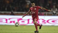 Gelandang Persija Jakarta, Sandi Sute, mengontrol bola saat melawan Bhayangkara FC pada laga Liga 1 di SUGBK, Jakarta, Jumat (23/3/2018). Kedua klub bermain imbang 0-0. (Bola.com/Vitalis Yogi Trisna)