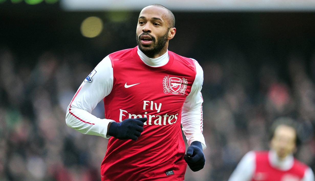 Thierry Henry. Striker asal Prancis yang pensiun bersama New York Red Bulls pada Januari 2015 merupakan top skor sepanjang masa bagi Arsenal. Selama 8,5 tahun dalam dua periode, 1999-2006 dan 2011 ia mampu mengoleksi 228 gol dari total 377 laga di semua ajang kompetisi. (AFP/Glyn Kirk)