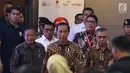 Presiden Joko Widodo atau Jokowi menghadiri penutupan perdagangan Indeks Harga Saham Gabungan (IHSG) 2018 di Kantor BEI, Jakarta, Jumat (28/12). IHSG 2018 ditutup menguat sebesar 0,06 persen atau 3,86 poin ke level 6.194,50. (Liputan6.com/Angga Yuniar)