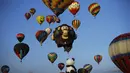 Beragam bentuk balon udara menghiasi festival tahunan QuickChek New Jersey ke-32 di Readington, (25/7/2014). (REUTERS/Eduardo Munoz)