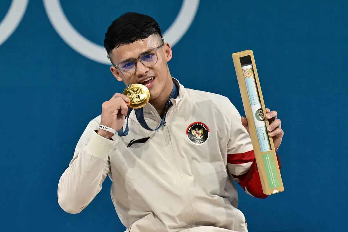 Raih Emas Angkat Besi Olimpiade Paris 2024, Rizki Juniansyah Cetak Sejarah dan Pecahkan Rekor "Clean and Jerk"