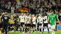 Pemain Jerman merayakan keunggulan sementara 2-1 dalam pertandingan kualifikasi Piala Dunia 2026 zona Eropa grup A melawan Irlandia Utara di RheinEnergieStadion, Jerman, pada 7 September 2025 waktu setempat atau Senin (8/9/2025) dini hari WIB. (INA FASSBENDER/AFP)