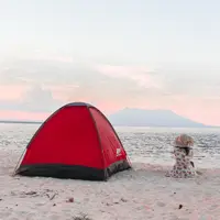 ilustrasi perempuan di pantai/Photo by Nofi Sofyan Hadi on Unsplash