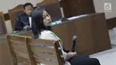 Direktur Keuangan PT Inersia Ampak Engineer (IAE), M Indung Andriani saat menjalani sidang pembacaan dakwaan di Pengadilan Tipikor, Jakarta, Rabu (20/8/2019). M Indung Andriani didakwa menjadi perantara suap untuk anggota komisi VI DPR RI, Bowo Sidik Pangarso. (Liputan6.com/Helmi Fithriansyah)