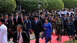 Presiden SBY beserta istri, Ani Yudhoyono, saat masuk ke kompleks upacara peringatan Hari Kesaktian Pancasila di Monumen Lubang Buaya, Jakarta, (1/10/14). (Liputan6.com/Johan Tallo)