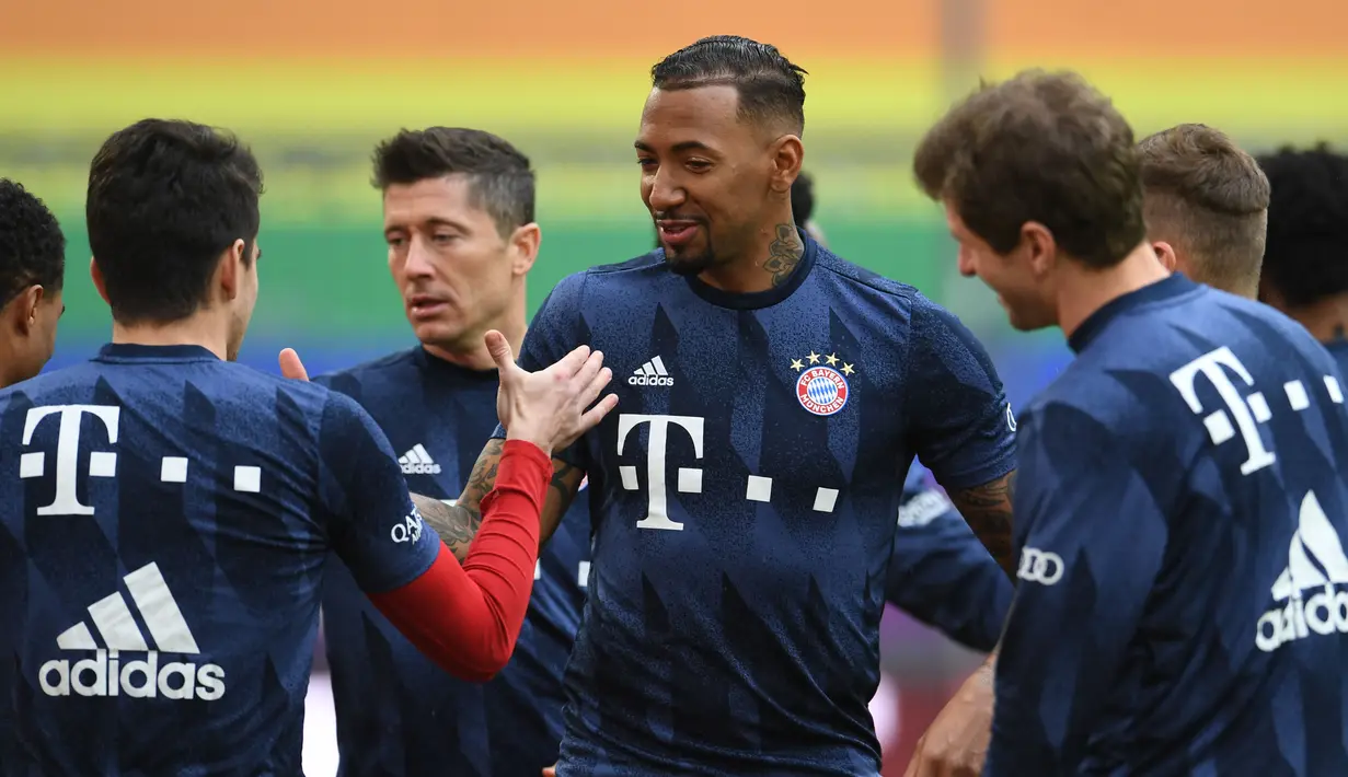 Lyon merekrut eks bek tengah Bayern Munchen, Jerome Boateng, pada hari terakhir bursa transfer musim panas 2021. Boateng bergabung dengan Lyon secara gratis karena kontraknya bersama Munchen telah habis Juni lalu. (Foto: AFP/Andreas Gebert)