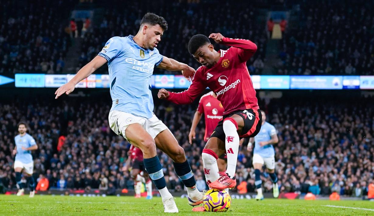 Namun Manchester United berbalik unggul 2-1 berkat gol Bruno Fernandes di menit 88 dan Amad Diallo di menit 90. (AP Photo/Dave Thompson)