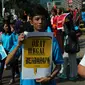 Badan Pengawas Obat dan Makanan (BPOM) melakukan aksi anti obat ilegal di Bundaran HI, Jakarta, Minggu (21/8). (Liputan6.com/Angga Yuniar)