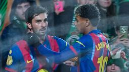 Barca baru bisa cetak gol pada menit ke-66 lewat gol Ferran Torres, sebelum Lamine Yamal memastikan kemenangan dengan golnya di injury time (90+6'). (AP Photo/Miguel Oses)