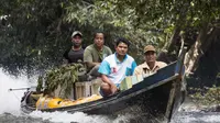 Proses pelepasliaran orangutan di Kalimantan  (Foto: International Animal Rescue (IAR) Indonesia)