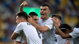 Selebrasi para pemain Israel setelah mencetak gol ke gawang Prancis pada laga semifinal Piala Eropa U-19 di DAC Arena, Dunajska Streda, Slovakia (28/6/2022). Israel lolos ke Piala Dunia U-20 2023 dengan status runner-up Piala Eropa U-19 setelah kalah 1-3 dari Inggris pada partai final. Israel berstatus debutan pada ajang Piala Dunia U-20 2023 di Indonesia. (AFP/Vladimir Simicek)