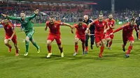 Pemain Wales rayakan kelolosan ke Piala Eropa 2016 (REUTERS/Dado Ruvic )