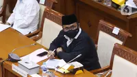 Menteri Agama Yaqut Cholil Qoumas saat mengikuti rapat kerja dengan Komisi VII DPR di Kompleks Parlemen, Senayan, Jakarta, Senin (15/3/2021). Rapat kerja tersebut membahas persiapan penyelenggaraan ibadah haji 1442 H/2021 M dan vaksinasi jemaah haji. (Liputan6.com/Angga Yuniar)