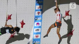 Raharjati Nursamsa menjadi juara dunia seri Jakarta setelah mengalahkan atlet panjat tebing Cina Xinshang Wang. (Liputan6.com/Johan Tallo)
