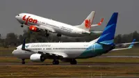 Pesawat dari berbagai maskapai penerbangan berada di apron Bandara Internasional Juanda Surabaya. Bandara Juanda menyiagakan penerbangan ekstra untuk mengantisipasi lonjakan penumpang.(Antara)