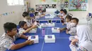 Pangkalan Udara (Lanud) TNI AU Halim Perdanakusuma melakukan uji coba program makan bergizi gratis di sejumlah sekolah yang berada di dalam kompleks Lanud Halim, Jakarta Timur. (Liputan6.com/Herman Zakharia)