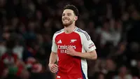 Di babak kedua, pada menit ke-58, Arsenal membuka keunggulan melalui tendangan bebas dari sisi kanan. Tendangan melengkung Declan Rice sempurna menaklukkan penjaga gawang Real Madrid, Thibaut Courtois. (Adrian Dennis/AFP)