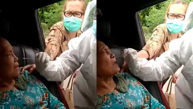 Seorang nenek menjalani tes swab