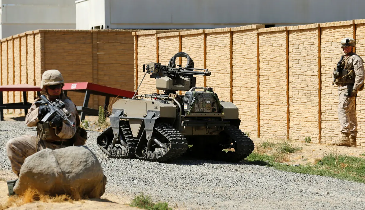 MUTT tampak melakukan patroli saat latihan militer Rim Pasifik (RIMPAC) 2016 di Camp Pendleton, Amerika Serikat, (13/7). Alat ini dilapisi dengan baja yang kuat dengan perlengkapan senjata pemusnah. (REUTERS / Mike Blake)