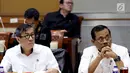 Menteri Hukum dan HAM Yasonna Laoly (kiri) bersama Jaksa Agung HM Prasetyo (kanan) mengikuti rapat kerja dengan Komisi III DPR di Kompleks Parlemen, Senayan, Jakarta, Kamis (13/9).(Liputan6.com/JohanTallo)