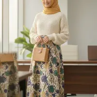 Ilustrasi Gamis Batik Katun/Gemini AI