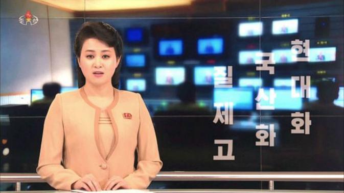 Presenter perempuan televisi negara Korea Utara (KCTV) (kredit: KCTV)