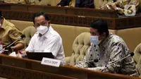Menteri Dalam Negeri Tito Karnavian (tengah) saat rapat kerja dengan Komisi II DPR di Gedung Nusantara II, Senayan, Jakarta, Selasa (5/4/2022). Rapat ini terkait Evaluasi Pelaksanaan Program dan Anggaran Tahun 2021. (Liputan6.com/Angga Yuniar)