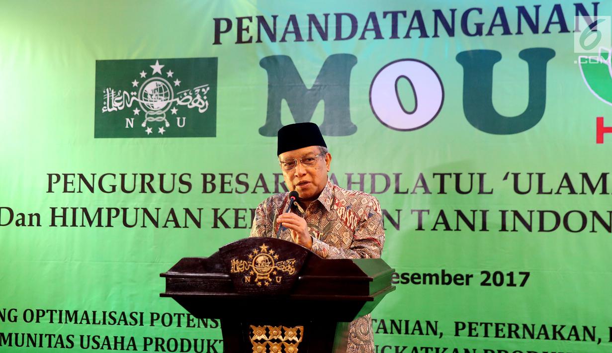 Ketua Umum PBNU KH Said Aqil Siradj memberikan sambutan saat penandatanganan kerjasama di Jakarta, Kamis (21/12). Kerjasama ini juga bertujuan untuk sinergi antara petani, peternak dan nelayan. (Liputan6.com/JohanTallo)