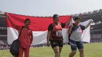 Atlet tolak peluru Indonesia, Suparniyati, meraih medali emas tolak peluru Asian Para Games di SUGBK, Jakarta, Senin (8/10/2018). (Bola.com/Vitalis Yogi Trisna)