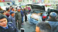 Ngeri, Bagasi Mobil Ini Dipenuhi Bangkai Anjing