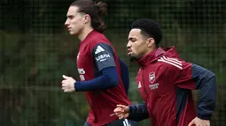 Laga kedua tim akan berlangsung di Emirates Stadium, Rabu (22/10/2025) dini hari pukul 02.00 WIB. (HENRY NICHOLLS/AFP)