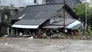 Hingga Rabu (10/9/2025) siang waktu setempat, hujan deras masih mengguyur sebagian wilayah. Sejumlah akses jalan di Denpasar, Bali juga ditutup. (SONNY TUMBELAKA/AFP)