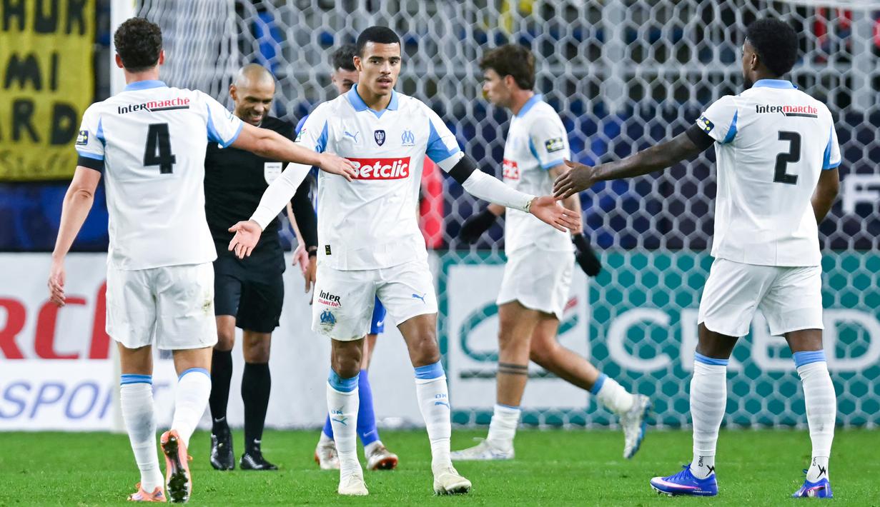 Mason Greenwood memimpin pesta gol Marseille dalam laga Coupe de France. Penyerang asal Inggris itu mencetak hat-trick saat timnya membantai Bayeux dengan skor telak 9-0. (AFP/Lou Benoist)