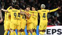 Pemain Barcelona merayakan gol dalam pertandingan melawan Paris Saint-Germain (PSG) pada leg pertama perempat final Liga Champions 2023/2024, Kamis (11/4/2024) dini hari WIB. (FRANCK FIFE / AFP)