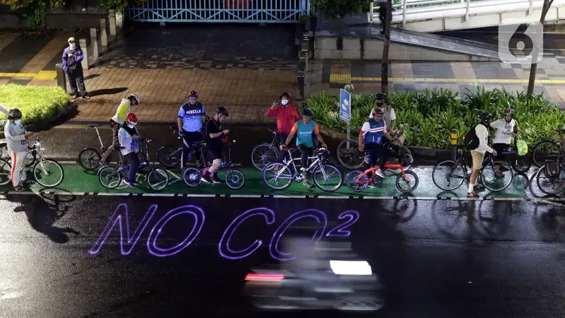 FOTO: Aksi Bersepeda Sebagai Solusi Kurangi Emisi dan Karbon