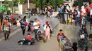 Warga memadati kawasan RPTRA Kalijodo, Jakarta, Minggu (30/12). Libur panjang jelang pergantian tahun dimanfaatkan warga untuk berlibur di kawasan RPTRA Kalijodo, Jakarta. (Liputan6.com/Helmi Fithriansyah)