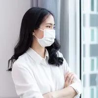 ilustrasi perempuan karantina mandiri/Sittipong Sirichamnan/Shutterstock