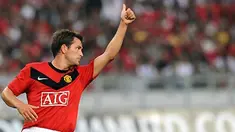 Michael Owen seusai mencetak gol untuk Manchester United yang berhadapan dengan Malaysia di Stadion Bukit Jalil, Kuala Lumpur. 18 Juli 2009. AFP PHOTO/Saeed KHAN