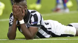 Ekspresi kecewa Paul Pogba gelandang Juventus. (AFP PHOTO/Oliver Lang)