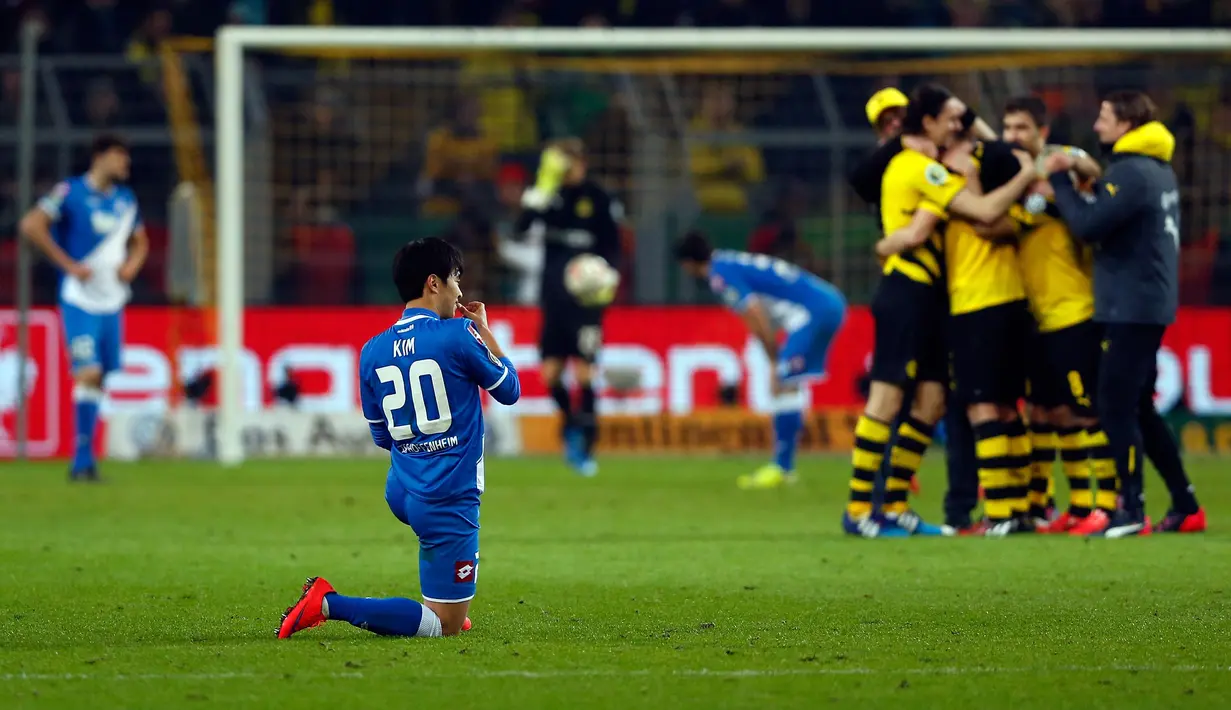 Terekam jelas perbedaan ekspresi penggawa Borussia Dortmund dengan Hoffenheim.