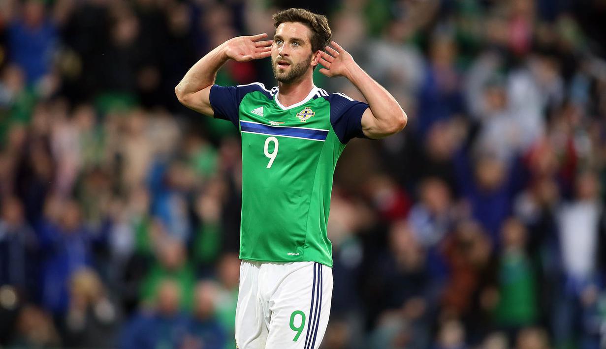 4. Will Grigg, mungkin namanya tidak mendunia, namun dirinya menjadi idola bagi suporter Wigan karena berhasil mencetak 20 gol dalam 43 laga. Nama bomber Irlandia Utara ini paling sering dicari pada 19 Juni hingga 25 Juni 2016. (AFP/Paul Faith)
