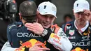 Kemenangan ini sekaligus keberhasilan Max Verstappen mempertahankan status pole position hingga akhir balapan. (Toshifumi KITAMURA/AFP)