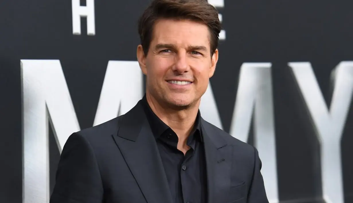 Kalau Tom Cruise miliki jet dengan toper Gulfstream IV-SP. (ANGELA WEISS  AFP)