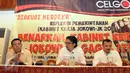 Politikus PDI Perjuangan Masinton Pasaribu (kiri) bersama Direktur Eksekutif Energy Watch, Ferdinand Hutahaean (kanan) saat melakukan diskusi bertajuk "Benarkah Kabinet Kerja Jokowi-JK Gagal?" di Jakarta, Kamis (24/12). (Liputan6.com/Helmi Afandi)